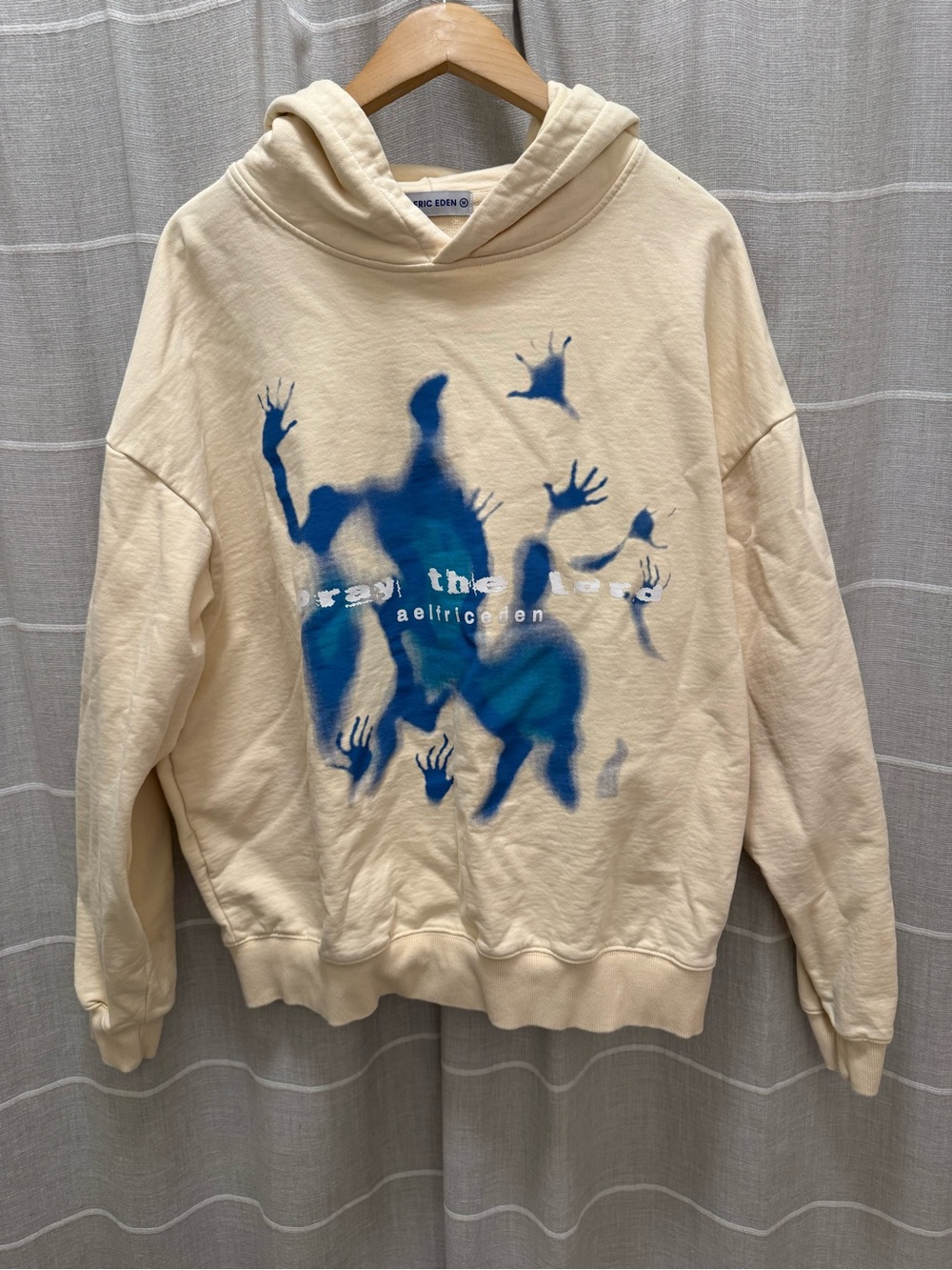 Aelfric Eden Men’s Cream Hoodie with Blue Graphic Art